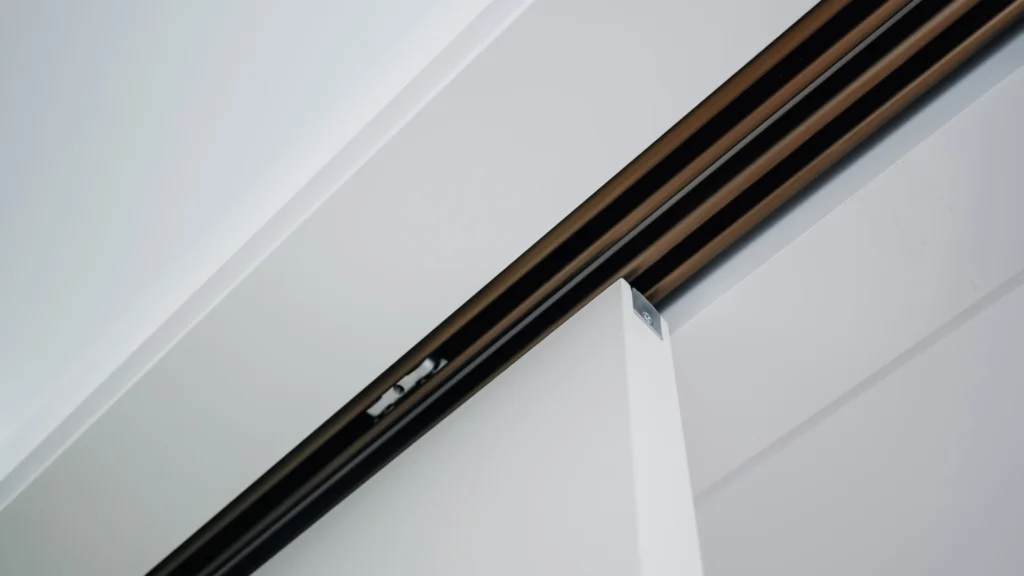 Custom sliding cabinet door aluminium track detail