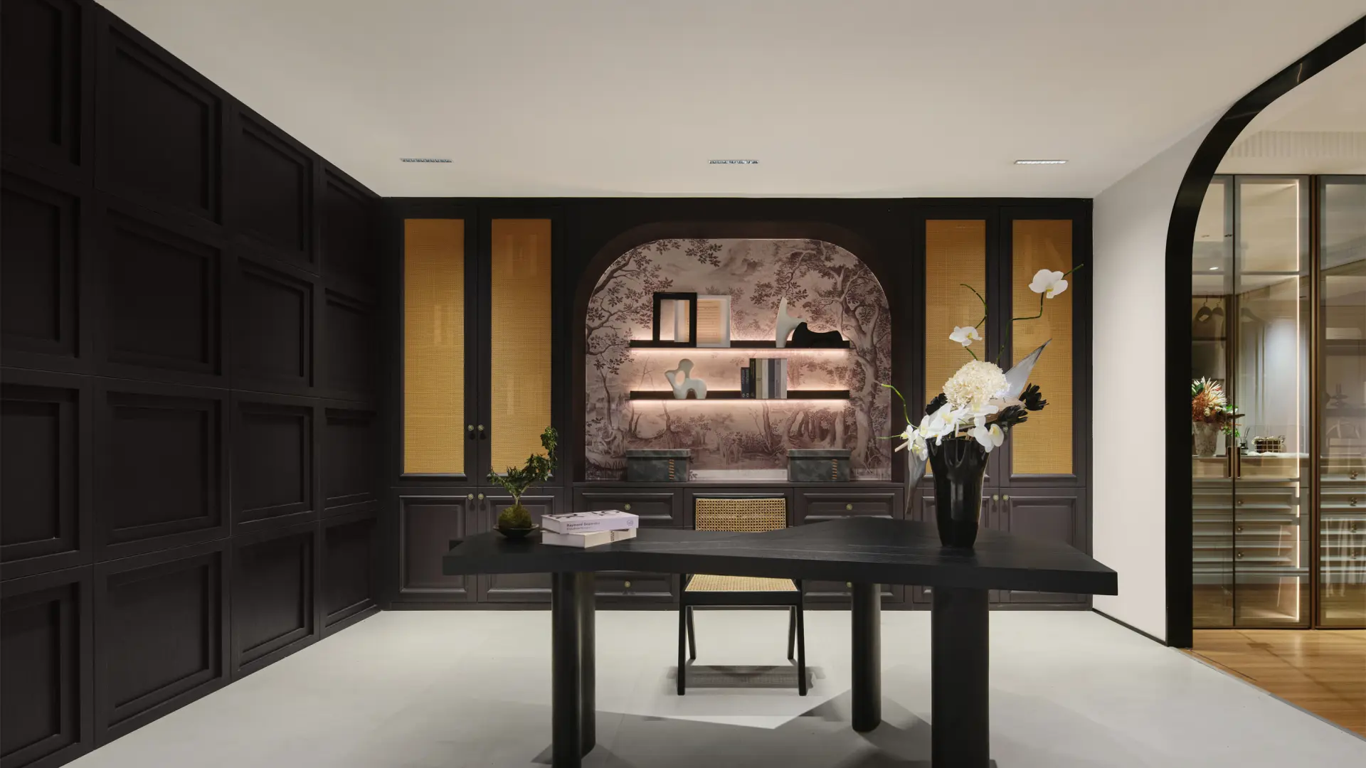 Integrated door and wall panel system with matching wood finishes